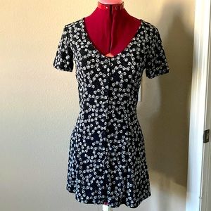 Forever 21 size XS black dress with
ditsy white floral print, pin dot pattern.